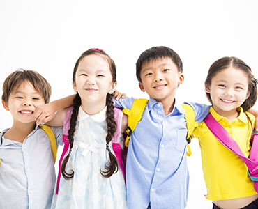 Group of happy smiling kids standing together